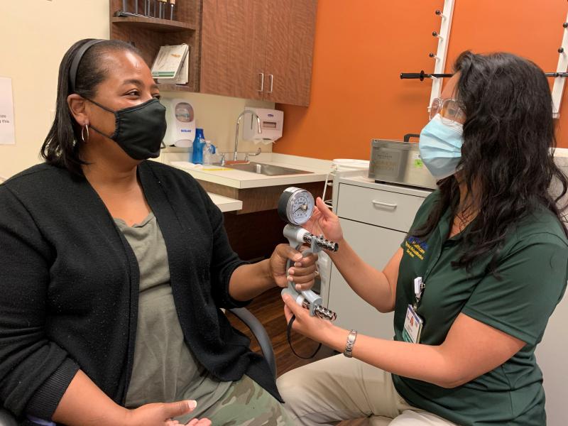Jeri Williams, left, works with occupational therapist Jen Guerin of Beebe Physical Rehabilitation Services at Georgetown. SUBMITTED PHOTO